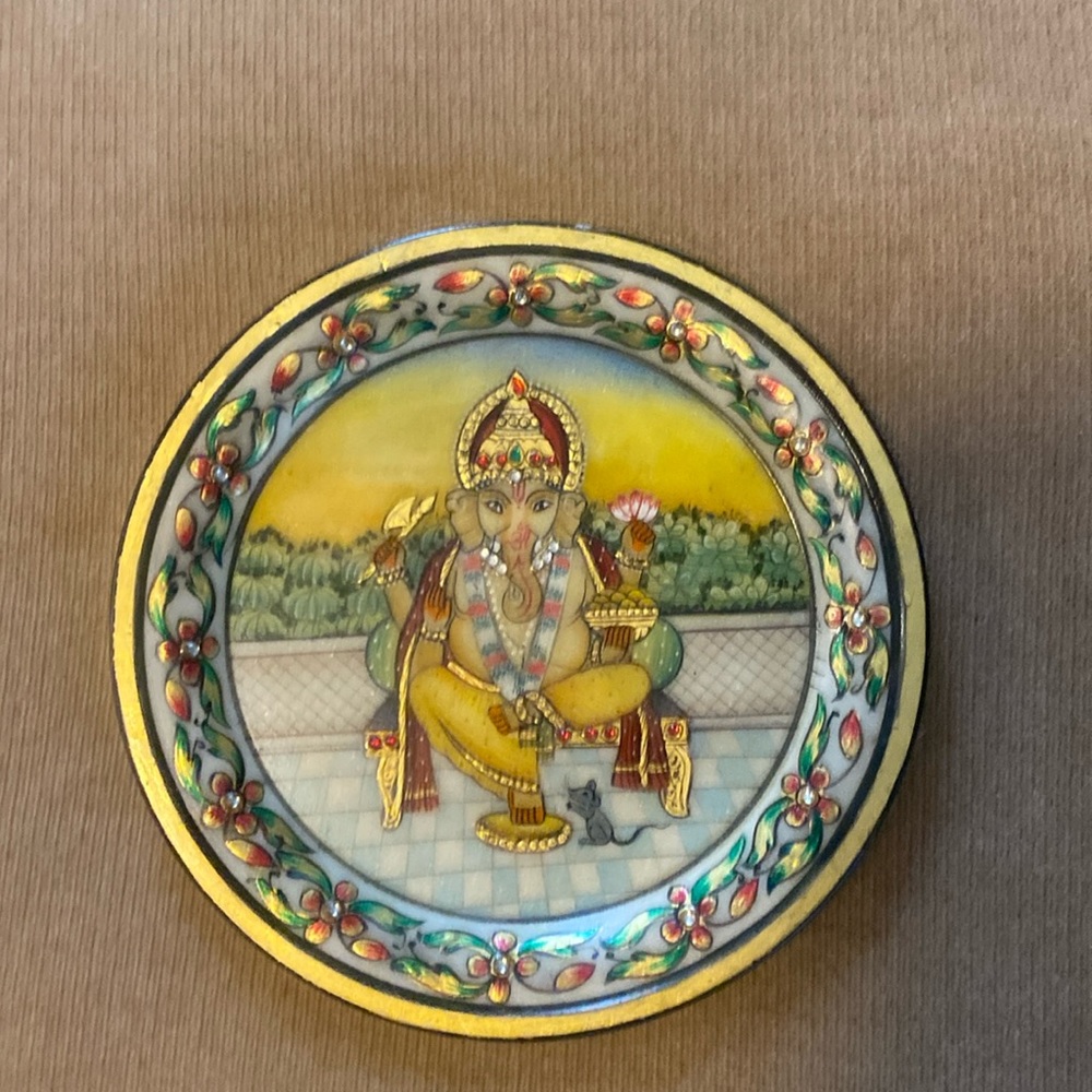 Ganesha marble material hand painted with ruby emerald and diamond accents!